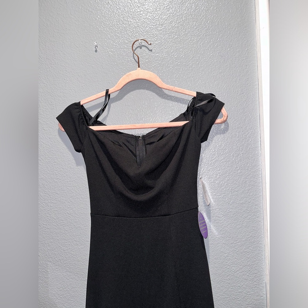 Black long off the shoulders dress. Size 1 with a slit on the leg.